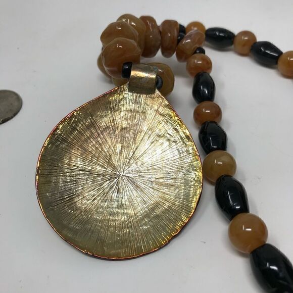Vintage Brass pendent with butterscotch and black plastic beads necklace. - Picture 3 of 6